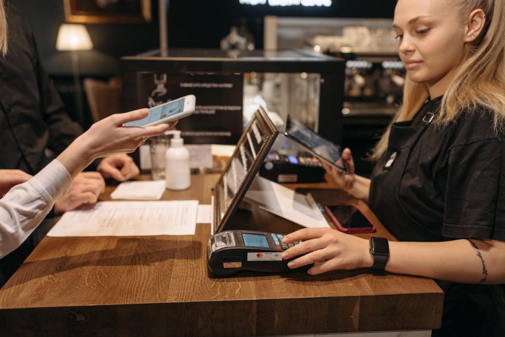 A traveler using a contactless payment app