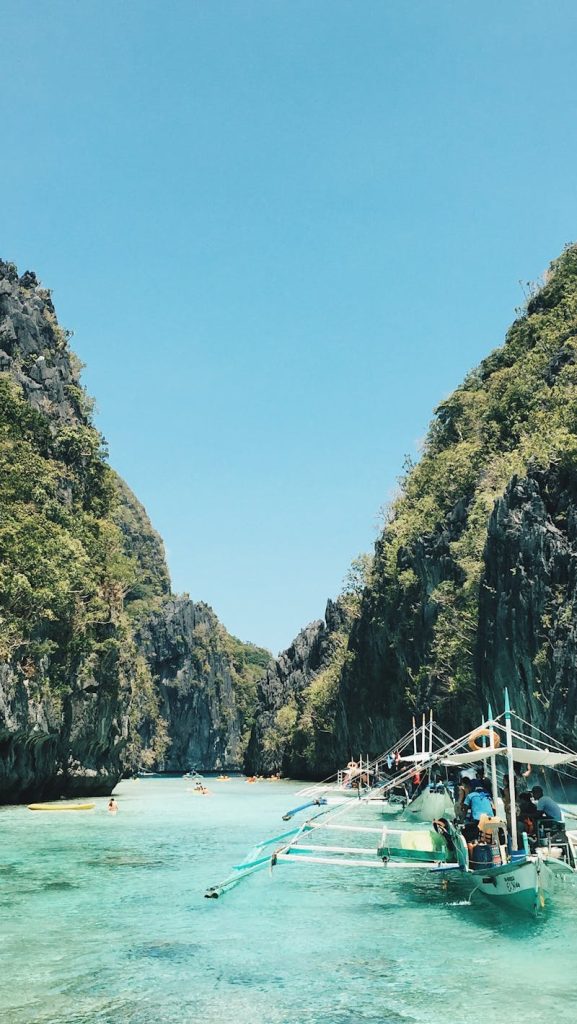 White and Green Sail Boat Photography, Philippines