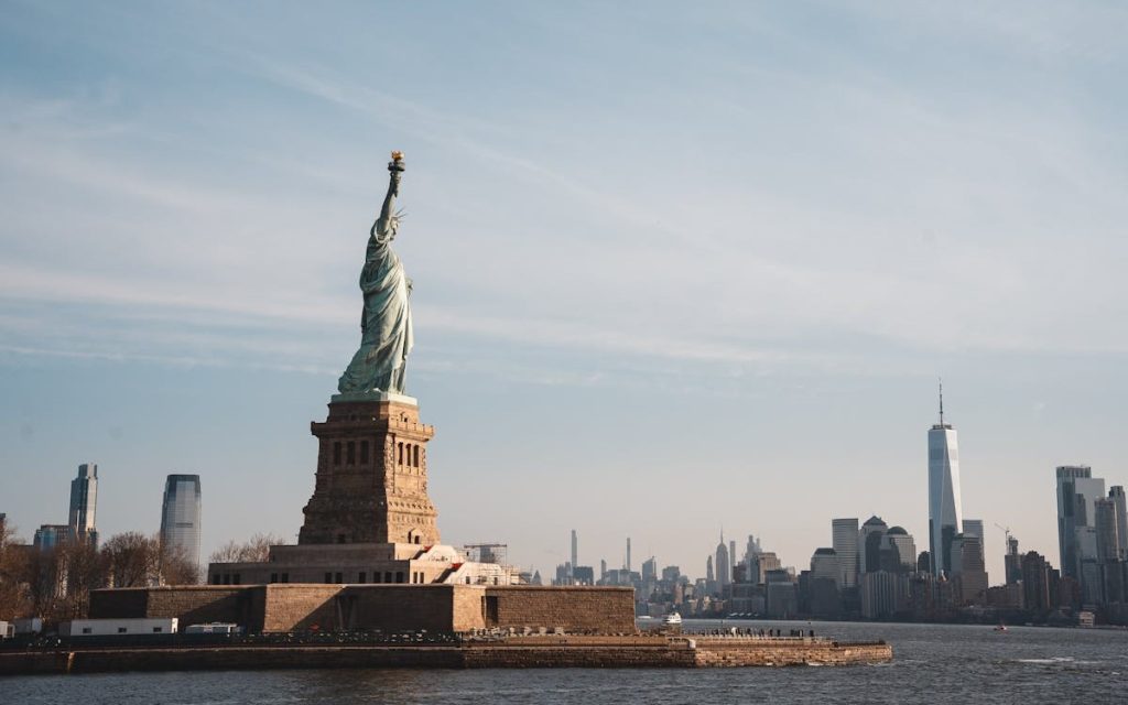 Statue of Liberty and NYC Skyline at Daytime
