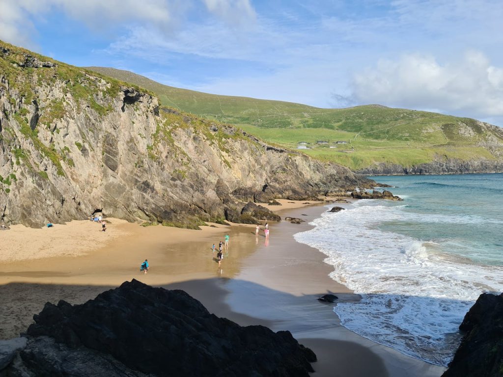 People Enjoying the Beach Sand