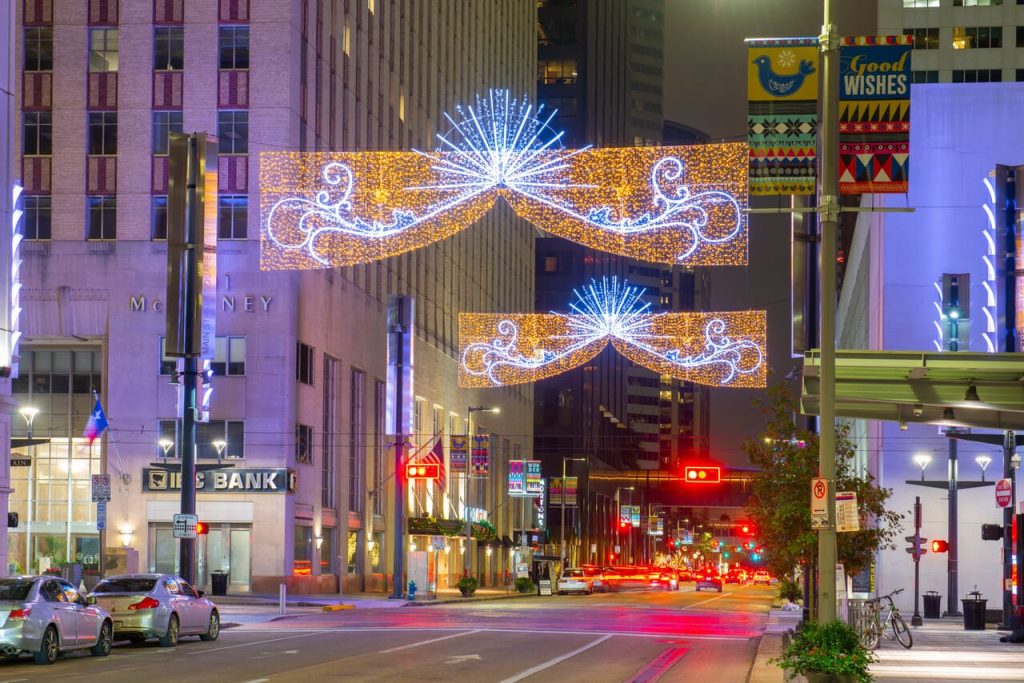 Houston downtown night scene on Mckinney Street at Main Street with Christmas decoration in city of Houston