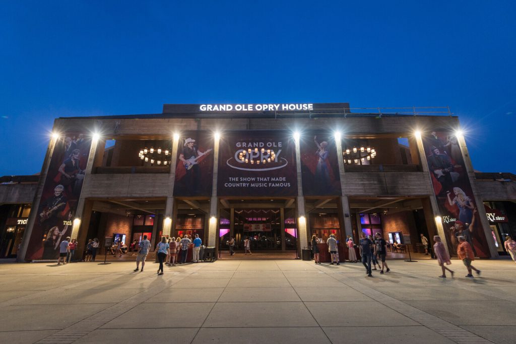 Grand Ole Opry stage lit in red and green