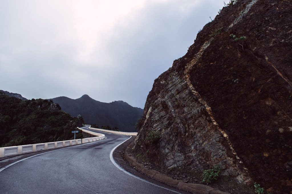A Winding Road beside a Mountain