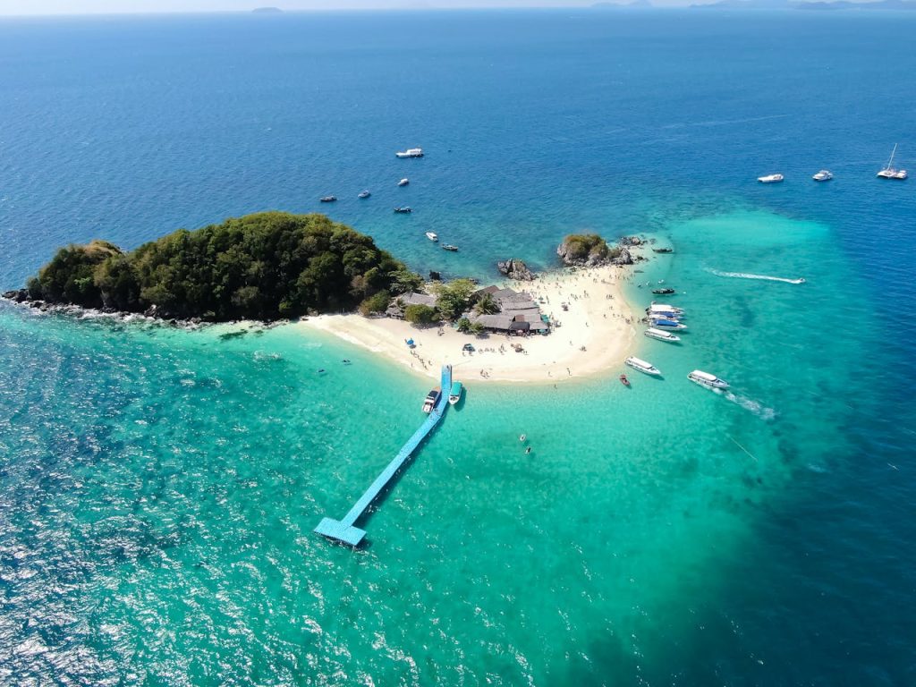 Aerial View With Drone. Koh Khai Nai island, Phuket, Thailand. Beautiful tropical island with white sand beach and turquoise clear water.