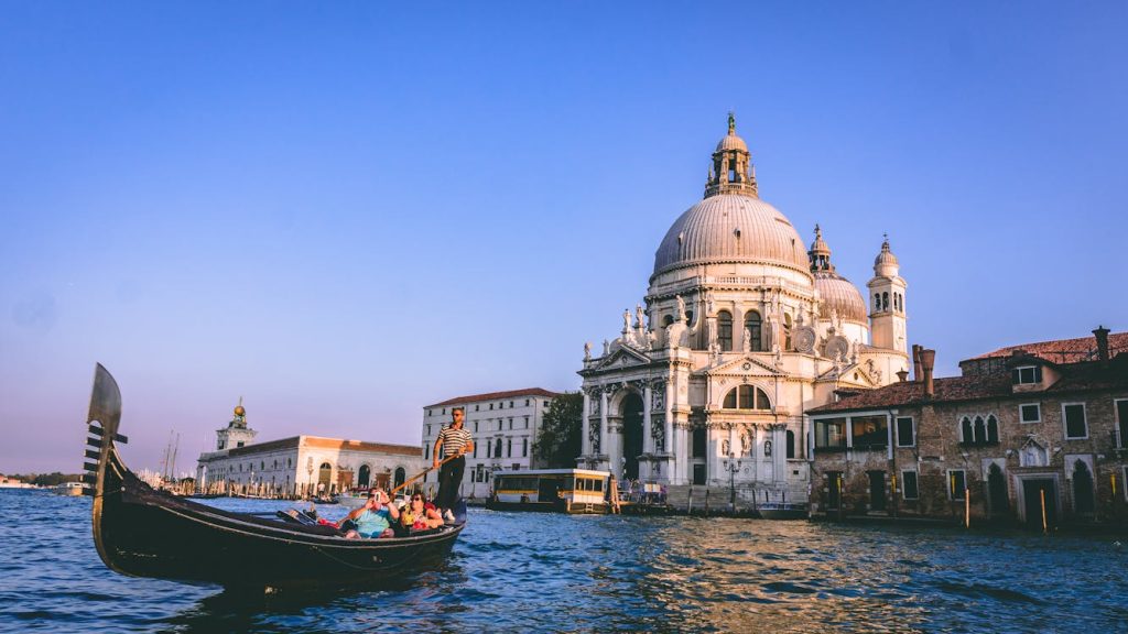 People On A Gondola in Venice, Italy