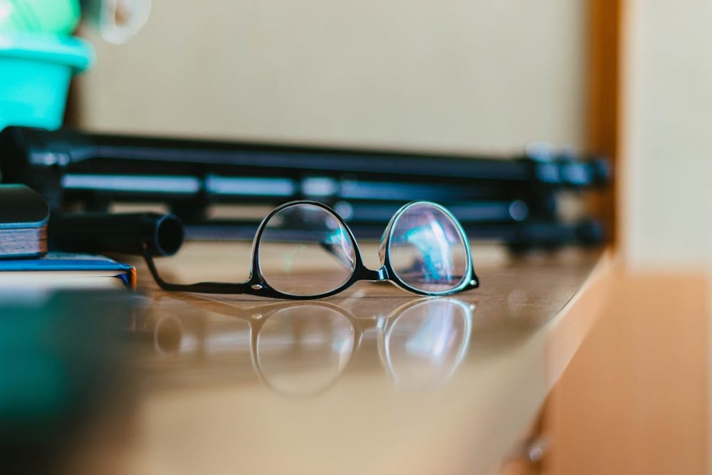 reading glasses on a desk
