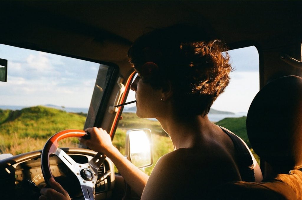 Woman Driving Car and Smokin