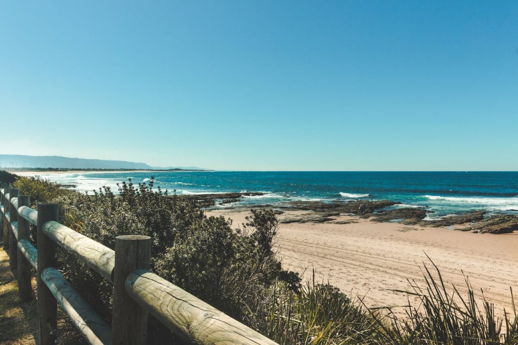 Empty beach with soft waves and cool weather light