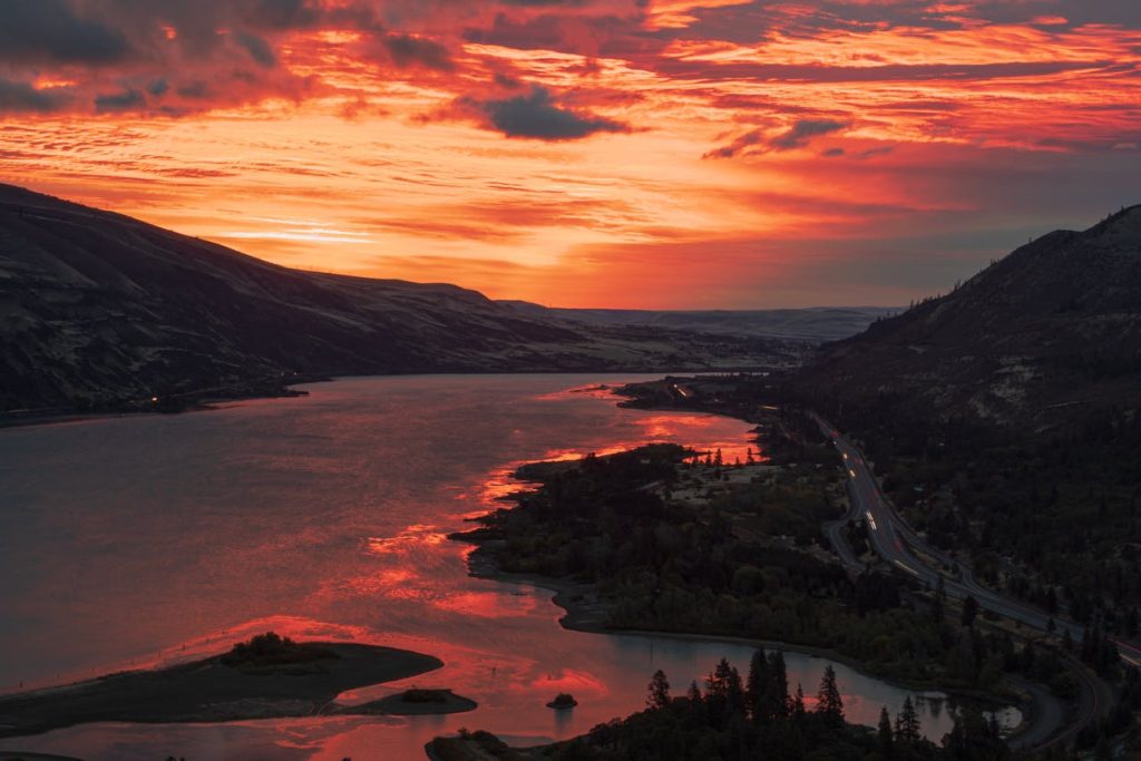 Sunset over River and Hills