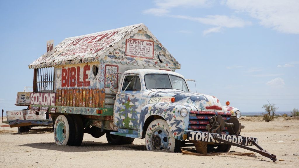 Graffiti on Abandoned Truck on Desert