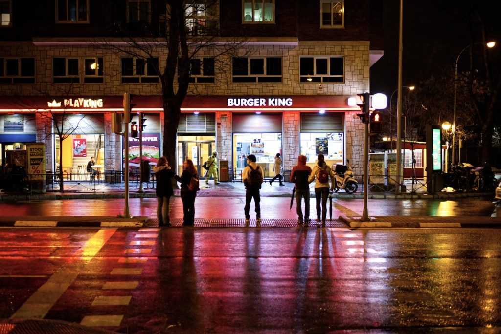 A wet, reflective street at night