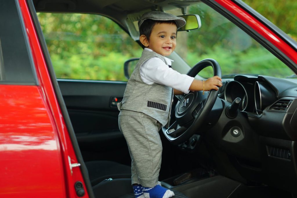 Kid sitting Alone in Car on a Trip