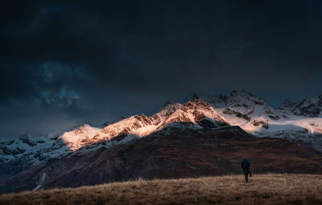 Man Walking in Mountains