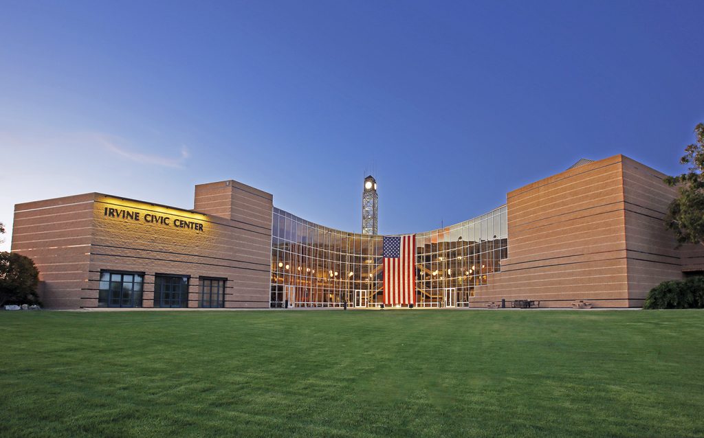 Irvine City Hall building displays American flag