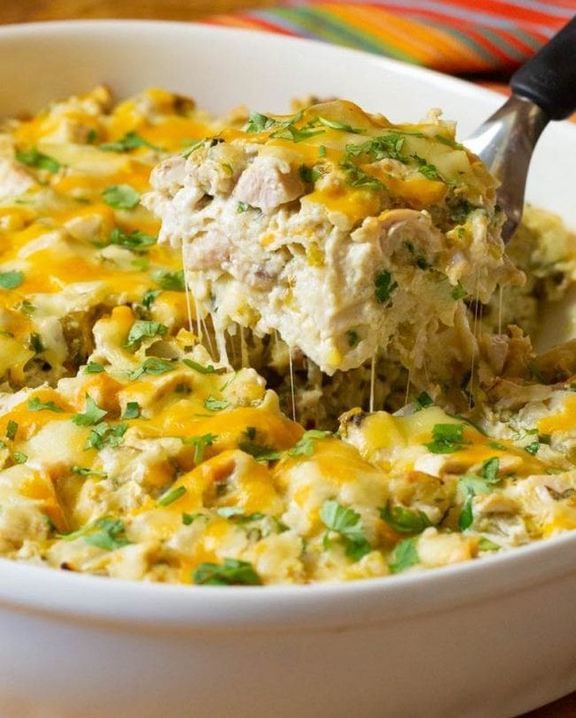 The Best Creamy Texas King Ranch Chicken Casserole Recipe loaded with chicken, tortillas, cheese, and green chiles.