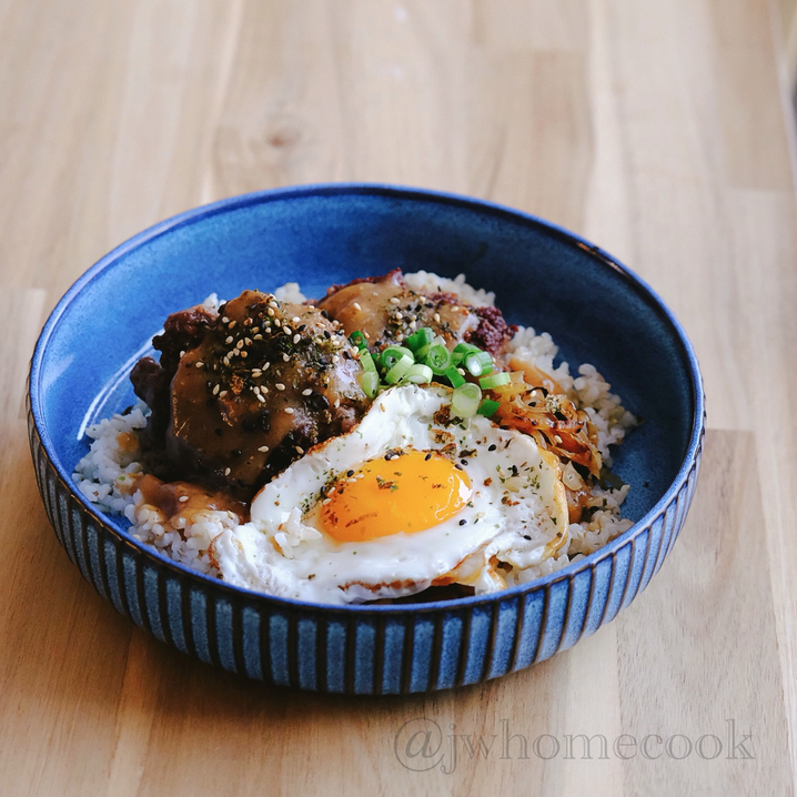 Loco moco a Hawaiian dish where burger is served on rice, topped with gravy and fried egg. 