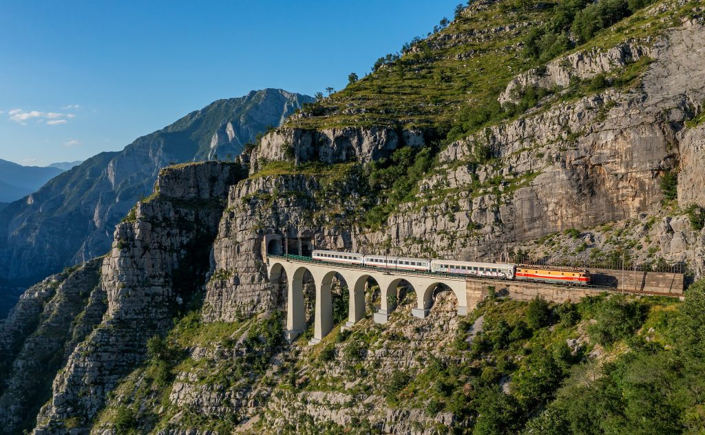 12 Scenic Train Rides in Europe Disrupted by Environmental Tourism Backlash – Her Life Adventures ZCG 461 039 with IC Beograd Bar at Lutovo