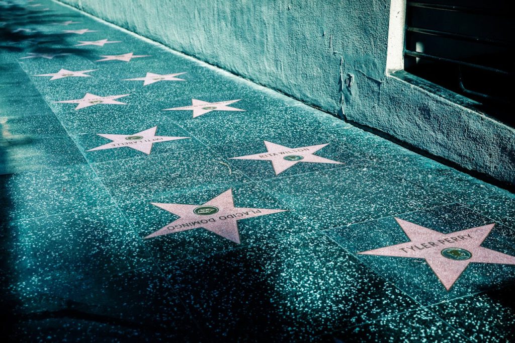 Pink Stars on Gray Tiled Street Sidewalk in Hollywood Walk of Fame, Los Angeles