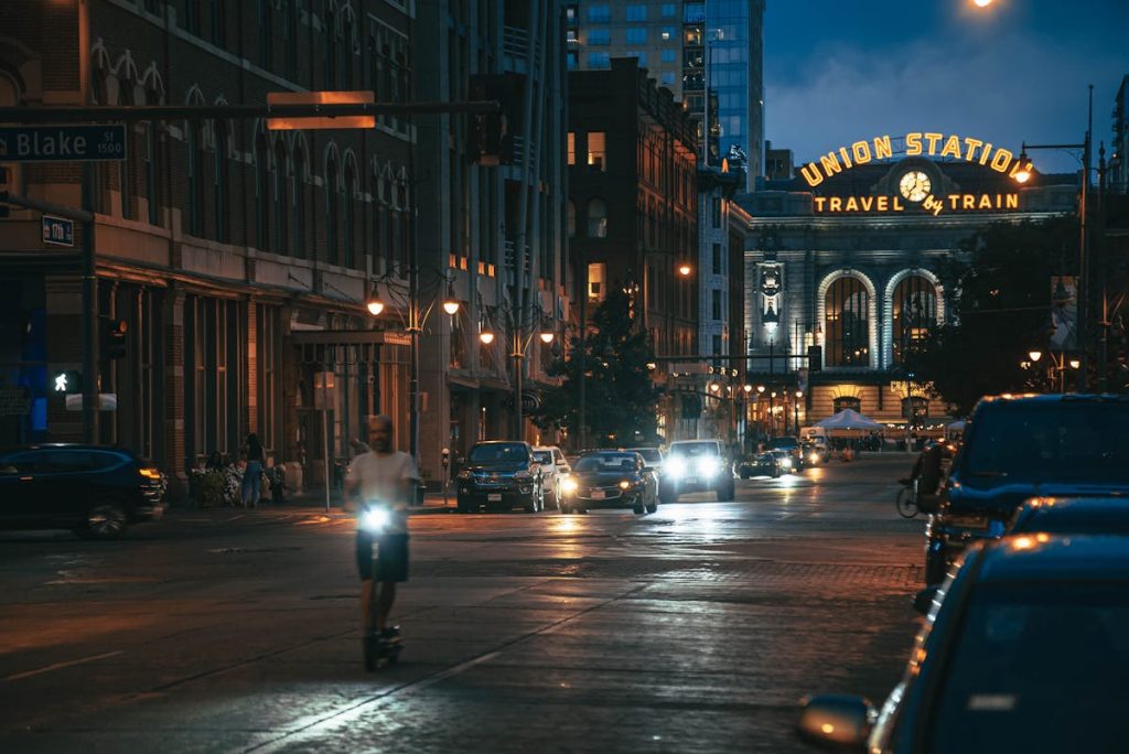 People Walking on Pedestrian Lane during Night Time
