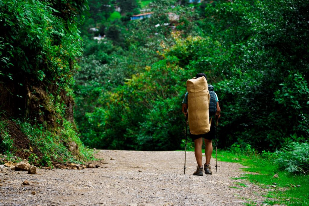 Solo Backpacker Hiking Lush Trail in Guatemala