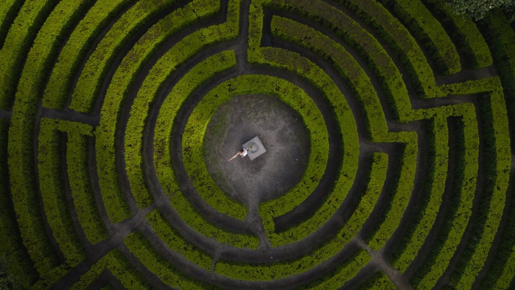 14 Moped Mazes Narrow With Near-Miss Mirrors – Her Life Adventures Woman Standing in Middle of Labyrinth