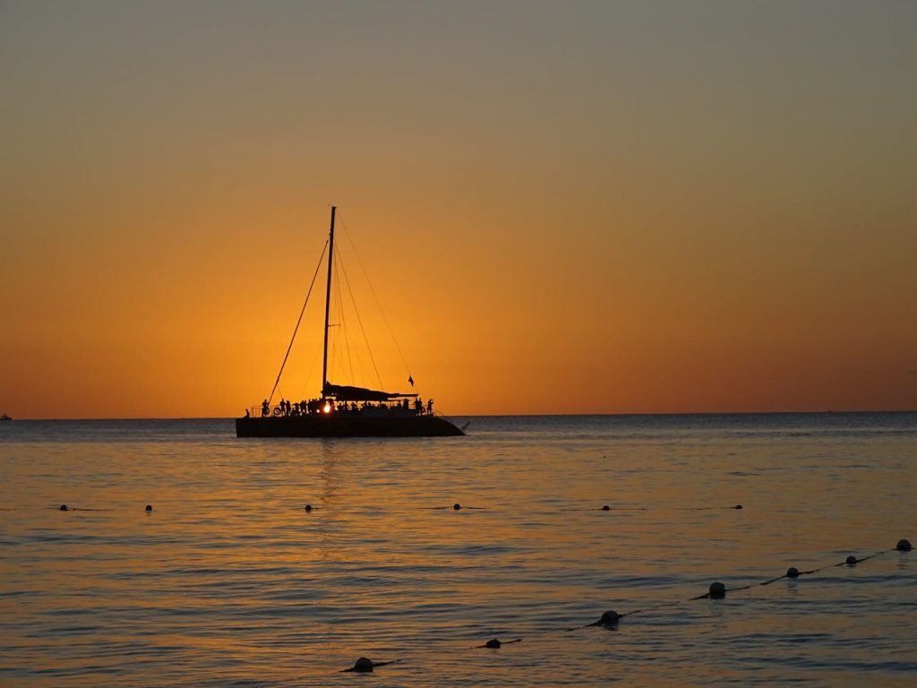12 Cruise Ship Excursions That Strand Passengers in Chaos – Her Life Adventures Silhouette of a Sailing Boat on the Sea during Sunset