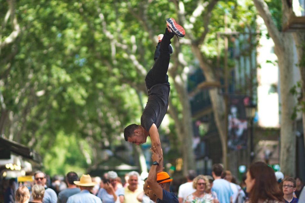 Men Doing Acrobats on the Street of Barcelona, CT, Spain