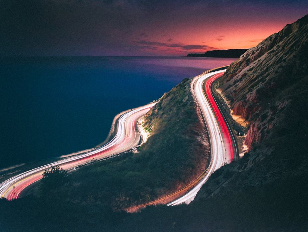 Time Lapse Photography of a Mountain Road at Night