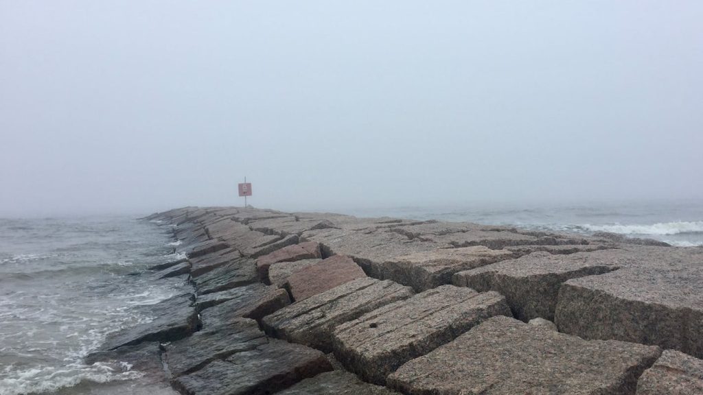 Foggy Ocean Jetty in Galveston, Texas