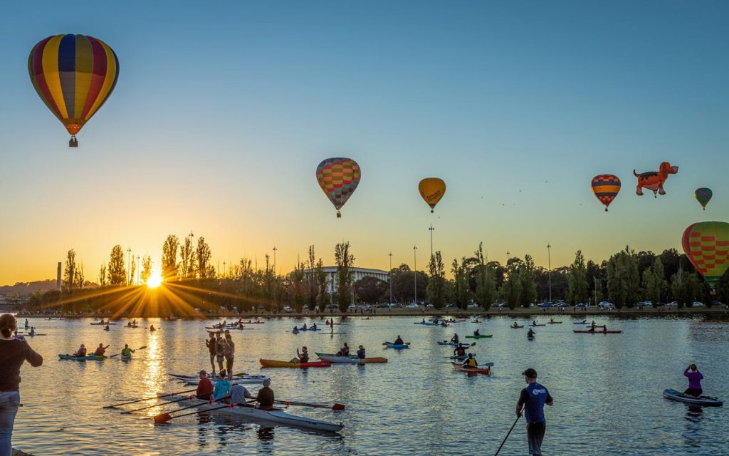 Hot Air Balloons and Kayaks at Sunrise in Canberra
