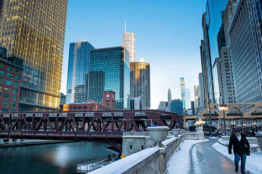 Man Walking Past the Chicago River