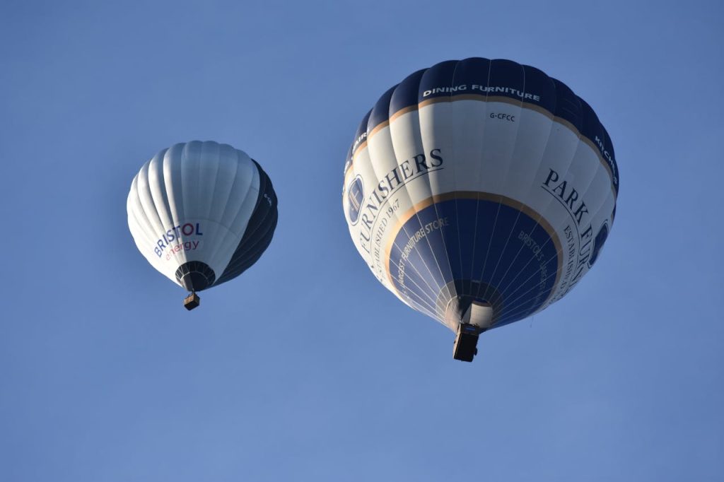 Low-Angle Shot of Hot Air Balloons Flying in Bristol, United Kingdom