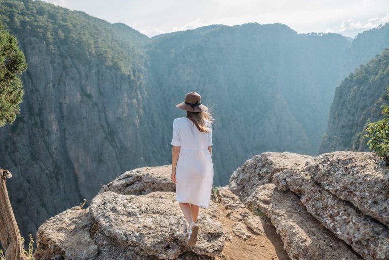 woman overlooking US mountain landscape