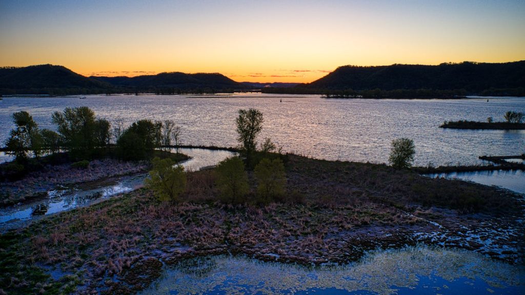 A Body of Water Near the Mountain Under the Blue Sky in MN, United States
