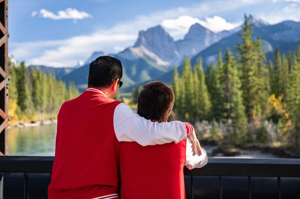 Couple Embracing on Scenic Bridge View